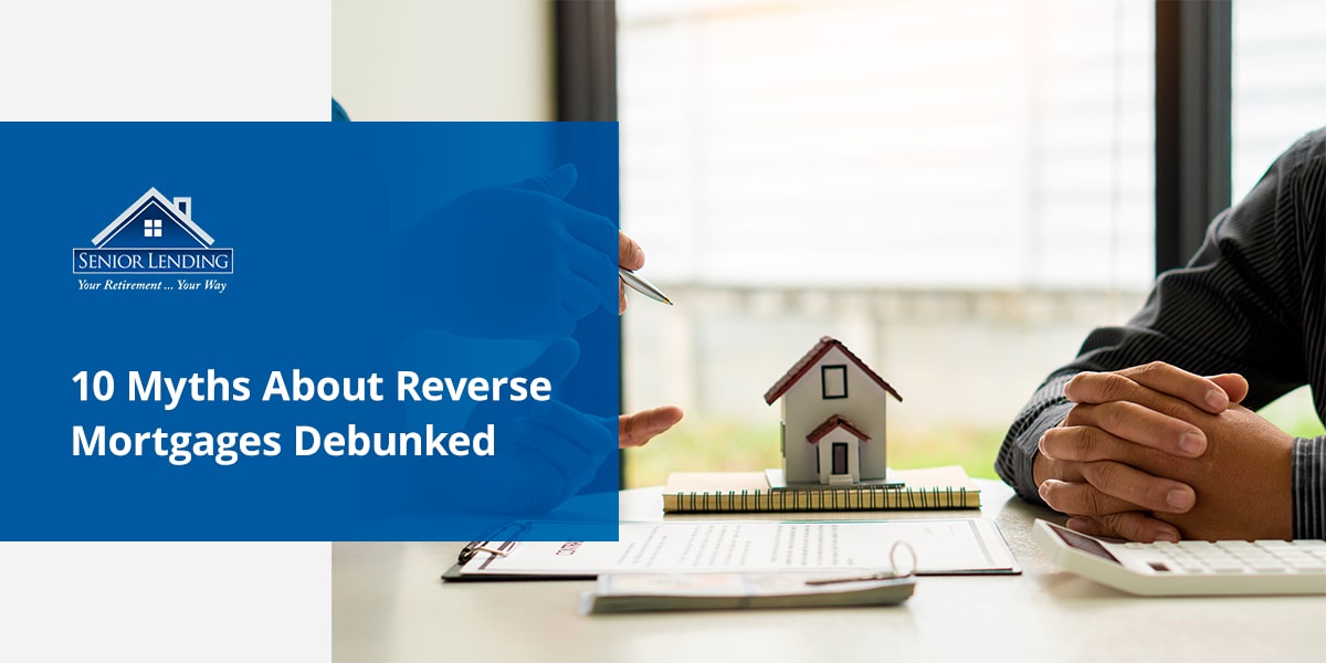 a blue sign that says 10 myths about about reverse mortgages debunked